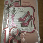 A4 Fashion/shoe themed 18th Birthday Card made using various dies including;Memory Box Gwyneth Flourish die, Tattered Lace Olivia die, Cheery Lynn High Heeled Steam Punk Shoe dies, Sizzix Bigz Sassy Serif Numbers dies, Britannia dies Happy Birthday sentiment, Jus Cutz nesting labels dies and Tattered Lace Ditsy Dots embossing folder. Woodware crafty edger tag border punch used for insert. - craftybabscreativecrafts.co.uk