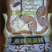 Large Butterfly Easel birthday card made using various dies including; Memory box Tristan, Chloe, Pippi and Isabella dies, My Favourite things Dainty bows dies, Britannia dies Happy Birthday Daughter sentiments dies, Cheery Lynn reflections boutique pearl french flair dies and flourishes from the Marianne scalloped circle frame die set. - craftybabscreativecrafts.co.uk