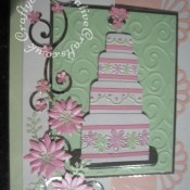 Embossed wedding Cake Wedding Card made using various dies including; Marianne creatables flowers 2 dies, Marianne frame and swirls set flourish dies, Cuttlebug frills and with love border embossing folders and Cuttlebug divine swirl embossing folder. - craftybabscreativecrafts.co.uk