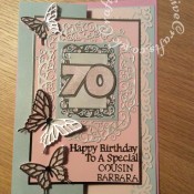 70th Birthday Card made using a variety of dies including; Sizzix Thinlits Intricate Butterfly dies, Sizzix originals Shadow Box Numbers dies, Tattered lace sentiments 2014 dies, Tattered Lace Alphabet Bunting dies for name & relation and Tonic studios Home Together die set- craftybabscreativecrafts.co.uk