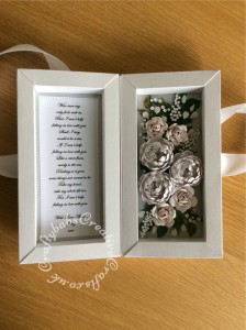 First Wedding Anniversary shadow box card replicating flowers in the bridal bouqet made using various dies including Tonic Shadow Box Creations die set, Heartfelt creations Majestic Blooms Die, Cheery Lynn Baby's breath flower die, Memory box Norrland flower dies, Altenew Garden Picks die set, Alt-e-new Layered Rose die set, free with issue 174 of Simply Cards & Papercraft magazine and Britannia Sentiment dies. - craftybabscreativecrafts.co.uk