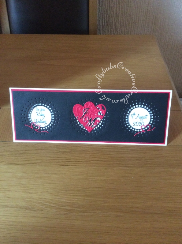 40th Ruby Wedding Anniversary Card made using a variety of dies including Memory Box sun burst, Marianne hearts, frantic stamper ribbon heart and Cheery Lynn Alphabet dies. Greeting printed. - craftybabscreativecrafts.co.uk