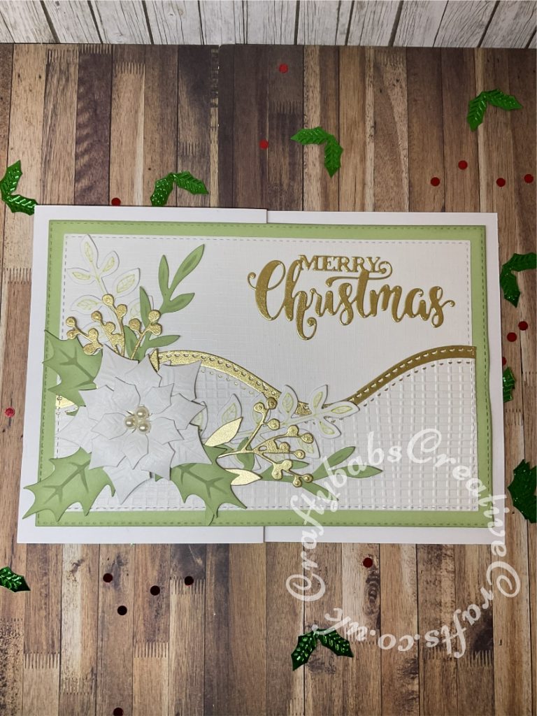 Christmas card inspired by a card I saw on Pinterest by https://bluerosepapertreasures.blogspot.com/2020/08/ornate-poinsettia-cards.html made using various dies including:- Spellbinders Borderabilities Curved borders, Spellbinders - Shapeabilities - Layered Poinsettia, Bright Rosa Sprigs and foliage dies, Pretty Quick Holly dies from Wreath making set, Sue Wilson Mini Expressions Stacked Merry Christmas Craft Die, unbranded nesting stitched rectangle dies and Crafters Companion Hessian embossing folder. - craftybabscreativecrafts.co.uk