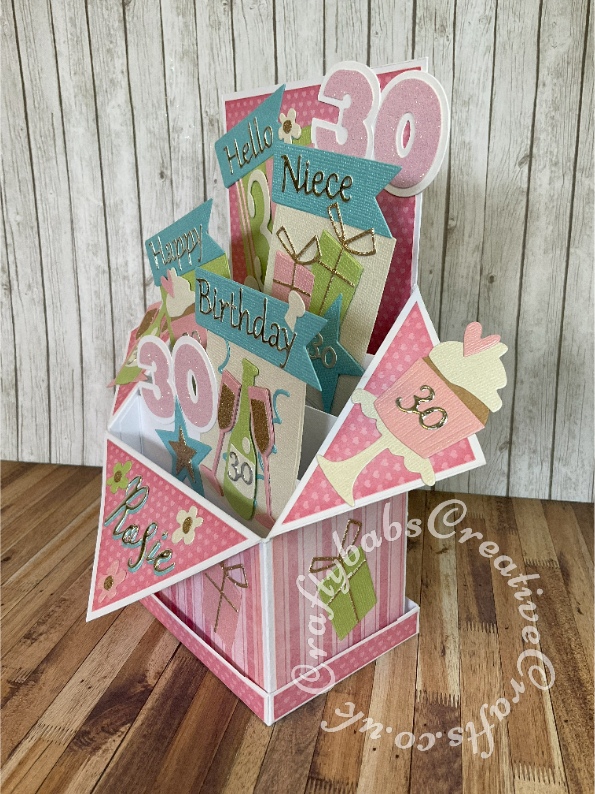 Extra Large Pop Up Box Birthday card made using various dies including Sizzix Thinlits Die Set Fabulous Everyday Shapes by Debi Potter, Sizzix Originals Shadow box numbers, Sizzix Thinlits Elle upper and lower case Alphabet dies, Card Making Magic All occasion sentiment dies and patterned backing card. - craftybabscreativecrafts.co.uk
